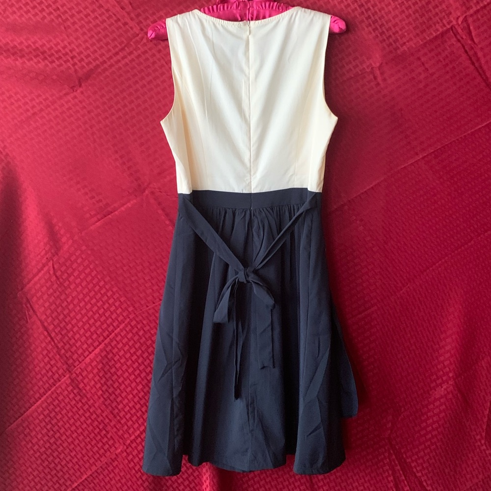 Beige/navy blue woman’s dress